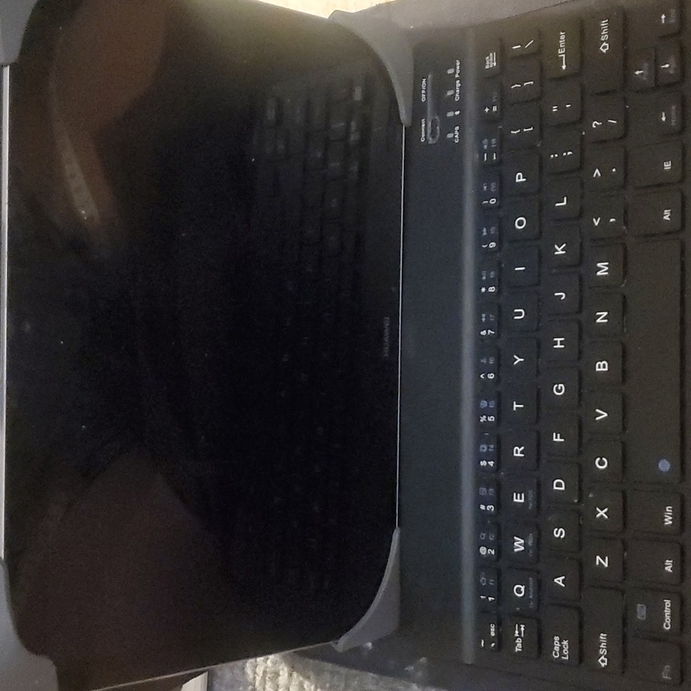 Tablet cover with  magnetic Bluetooth keyboard attached